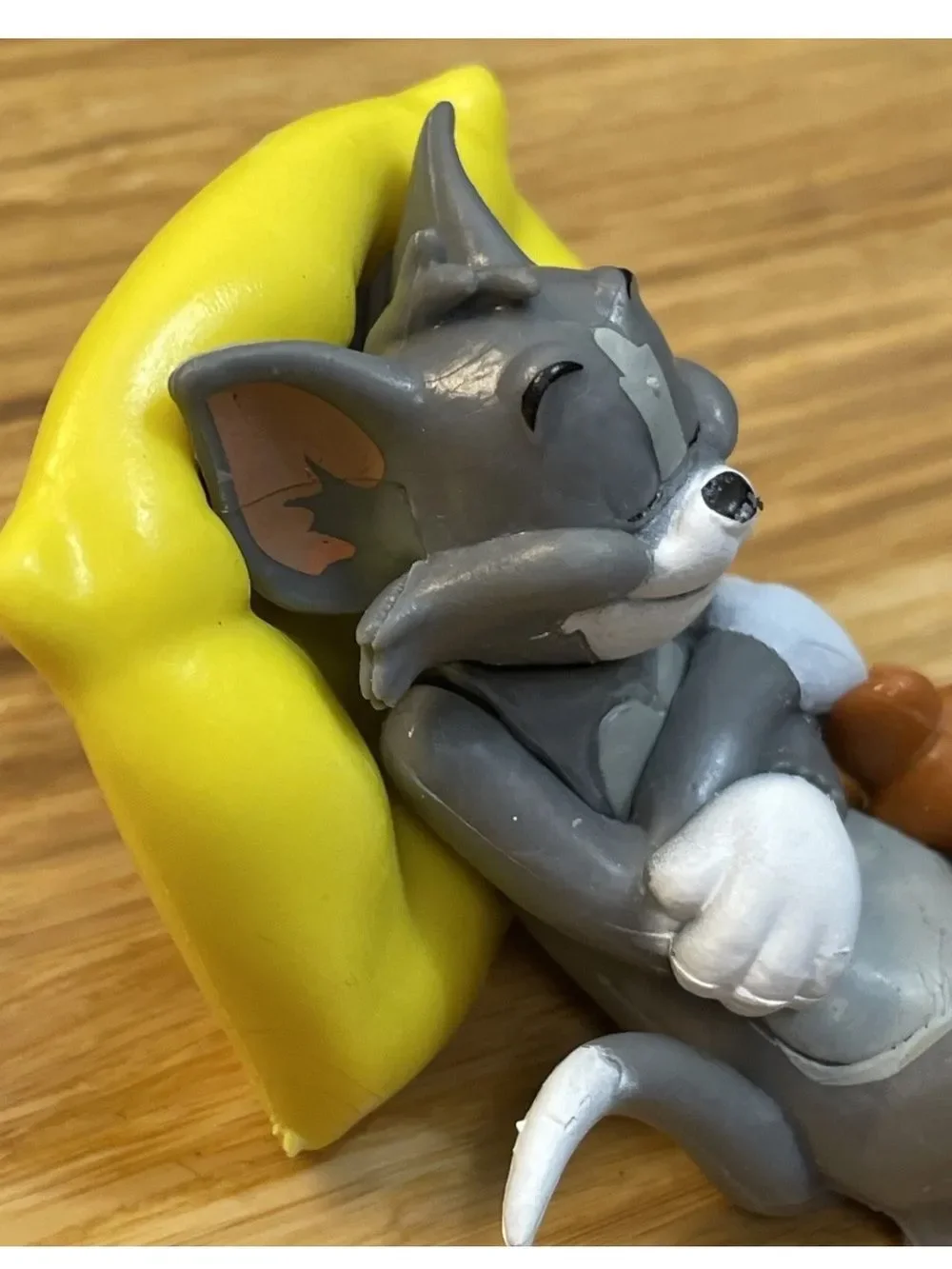 Warner Bros. Gray Tom & Brown Jerry with Yellow Cheese Bed Figurine